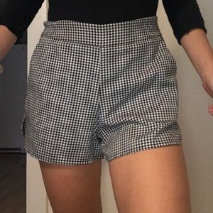 Brandy Melville black and white zip up shorts